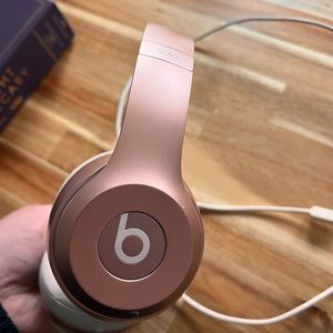 Beats by Dre rose gold headphones
